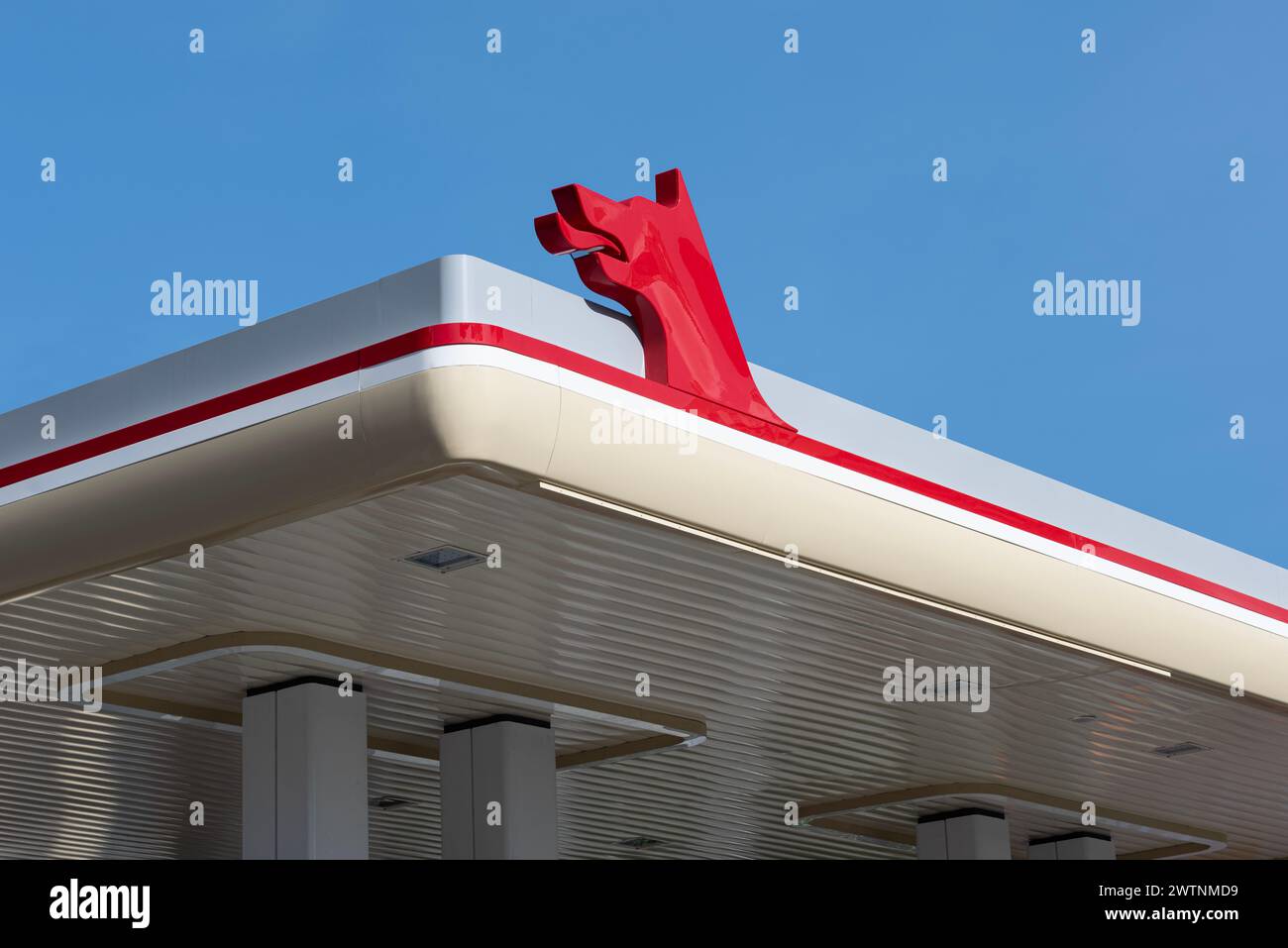 ISTANBUL, TURKEY - MARCH 12, 2024: Red petrol station of the Ofisi company is in center of city. The Petrol Ofisi is a fuel products distribution and Stock Photo