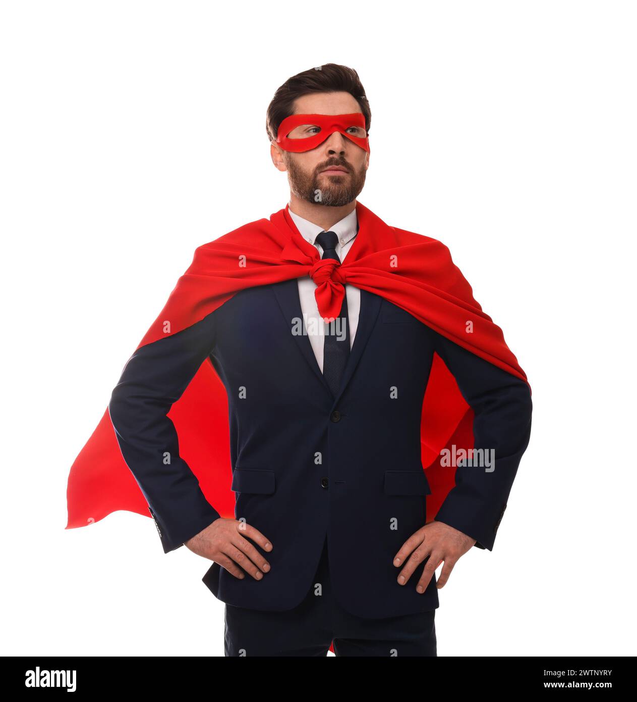 Confident businessman wearing red superhero cape and mask on white ...