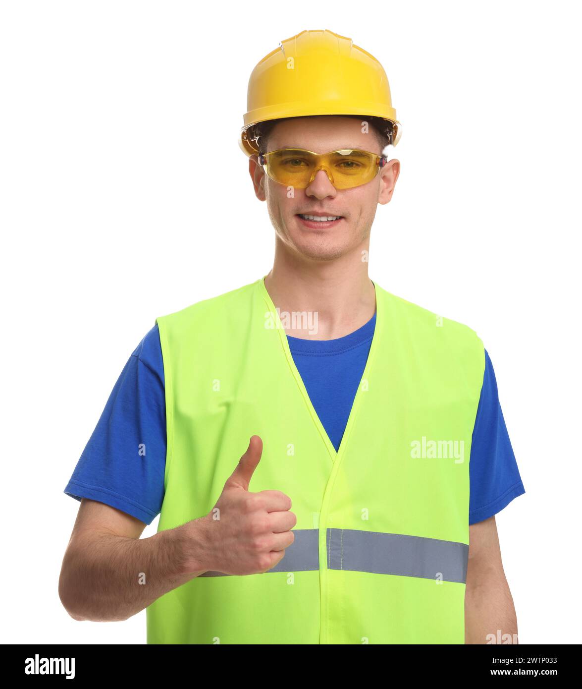 Young man wearing safety equipment and showing thumbs up on white