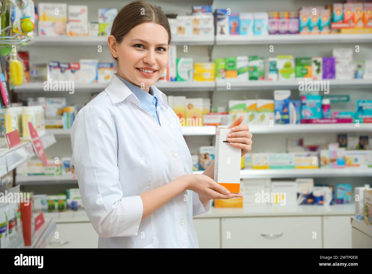 Smiling female pharmacist work hi-res stock photography and images - Alamy