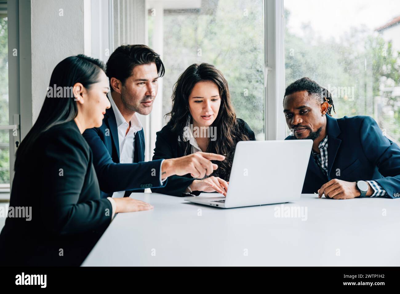 Men In Workplace Diverse business professionals, both men and women, work together in ...