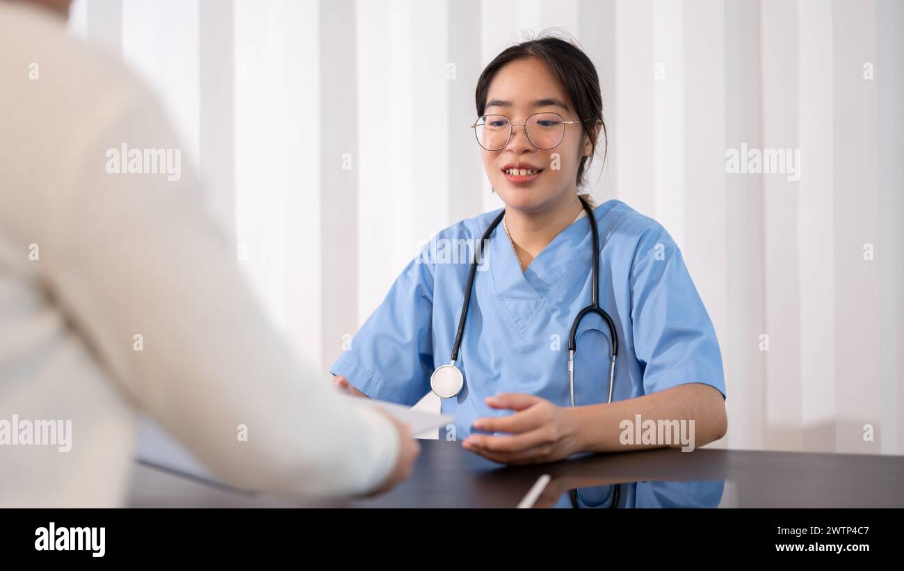 Asian female doctor talking advice hi-res stock photography and images ...