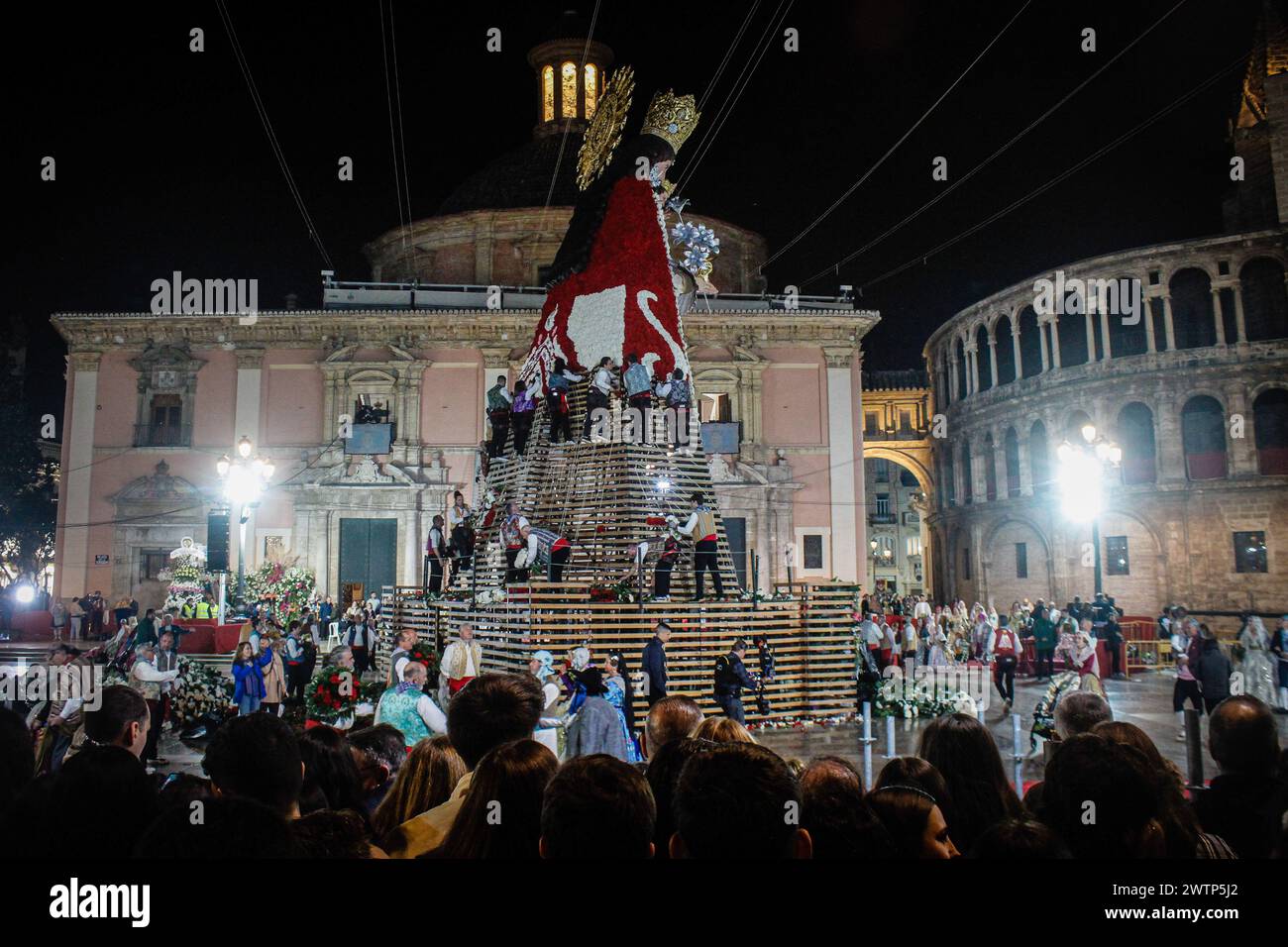 Valencia, Spain. 17th Mar, 2024. An image of the virgin as people place ...