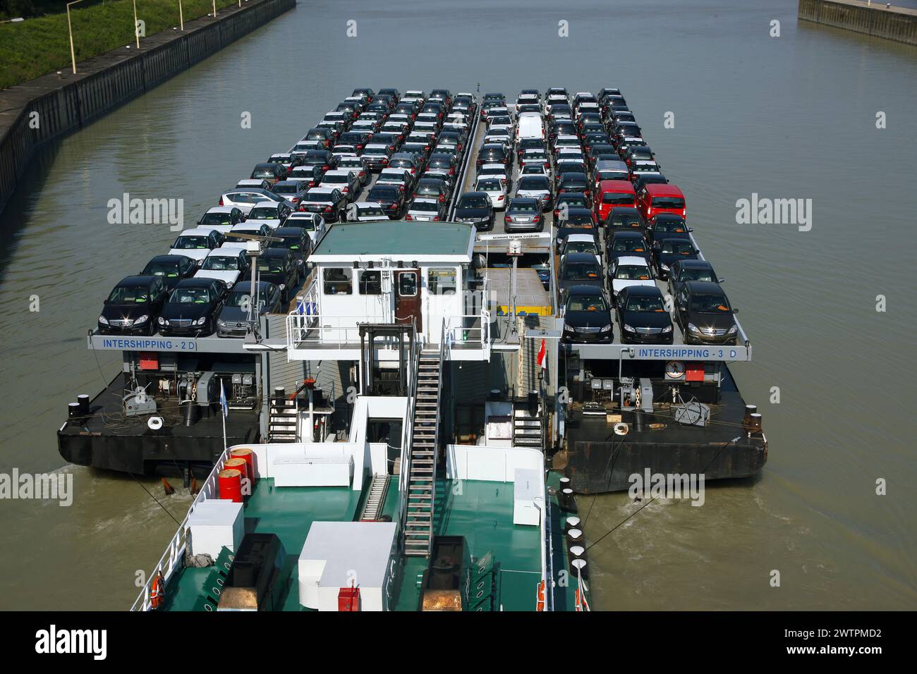 A barge fully loaded with new cars Stock Photo Alamy