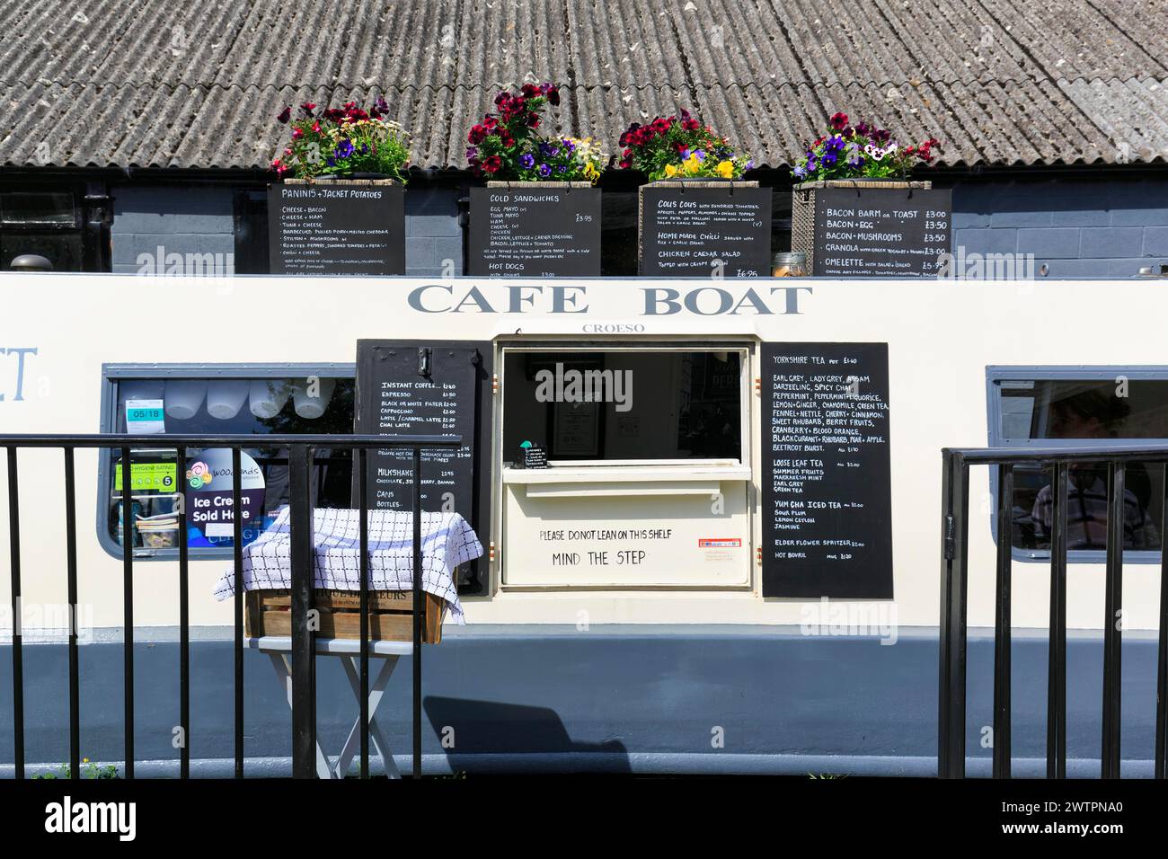 Cafe in boat, narrowboat, canal boat, restaurant, Llangollen Wharf, Llangollen Canal, Trevor, Wrexham, Wales, United Kingdom Stock Photo