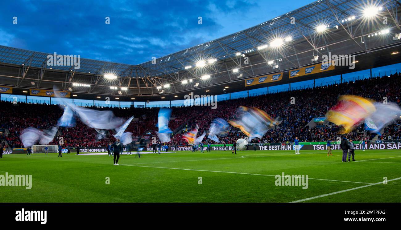 Flag waving, flags, motion effect, wiping effect, blue hour, long shot, evening lighting, PreZero Arena, Sinsheim, Baden-Wuerttemberg, Germany Stock Photo