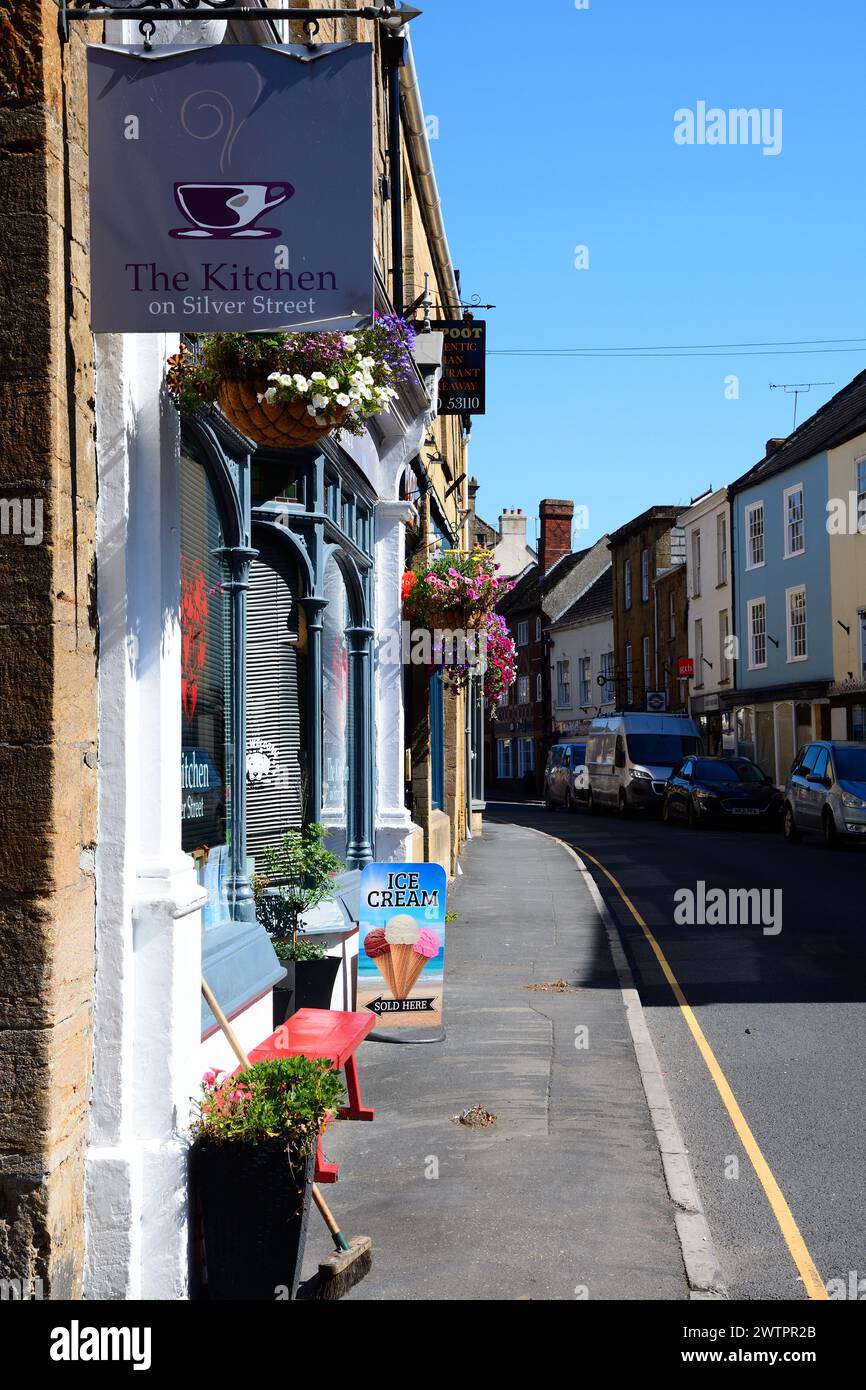Traditional shops along Silver Street in the town centre, Ilminster, Somerset, UK, Europe. Stock Photo