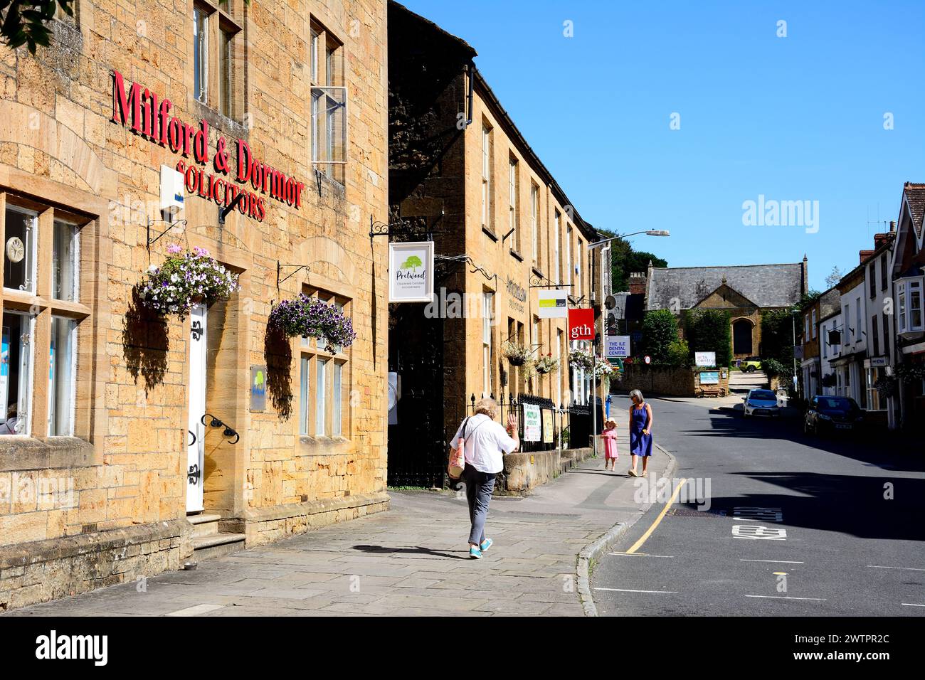 Professional businesses along East Street including a Solicitors and a dentist surgery, Ilminster, Somerset, UK, Europe. Stock Photo