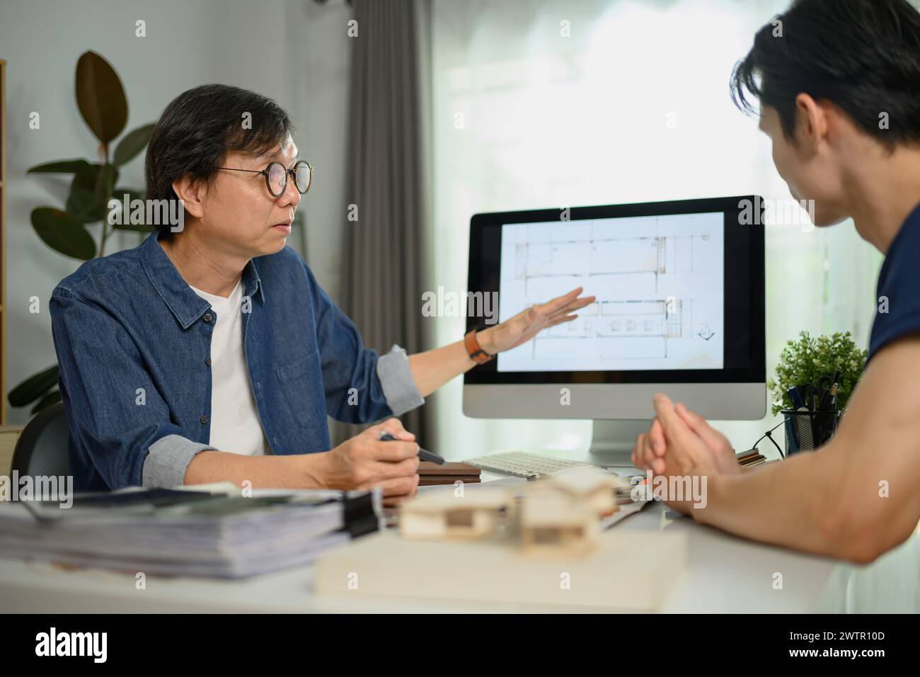 Interior designer showing work client hi-res stock photography and ...