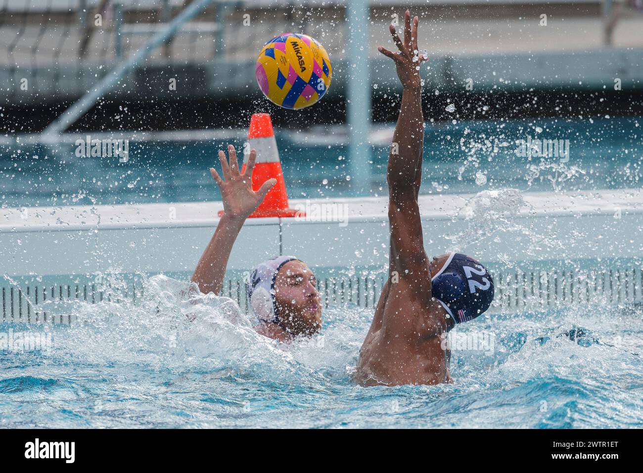 U.S. Olympic Water Polo Team attacker Max Irving, right, trains with