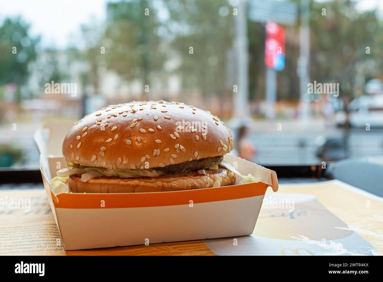 Open box with Big Mac burger on the table in McDonald's restaurant. Minsk, Belarus - May 18, 2022 Stock Photo