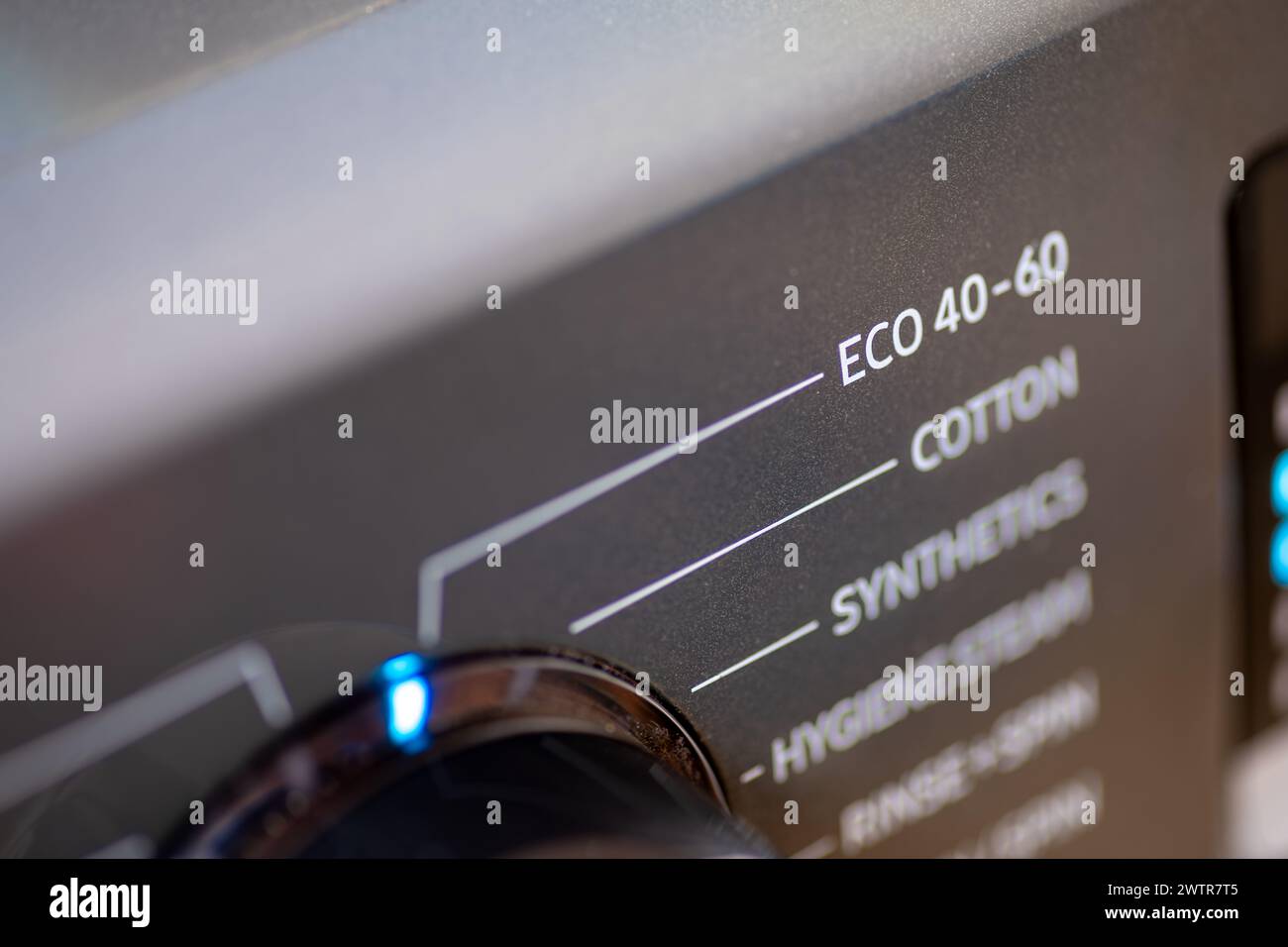 A energy saving, environmental concept with a washing machine setting