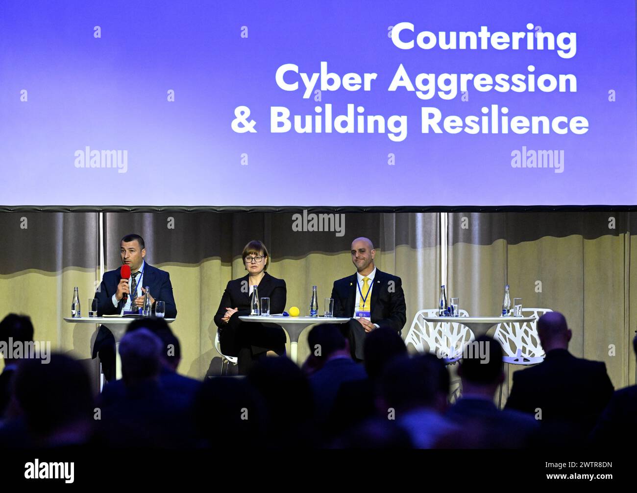 Prague, Czech Republic. 19th Mar, 2024. From left cyber security expert at National Authority