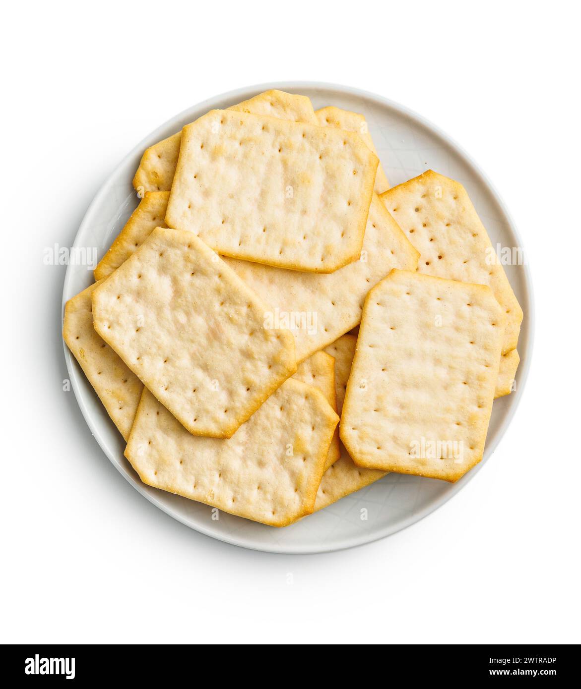 Crackers on a plate. Isolated on white background. Stock Photo