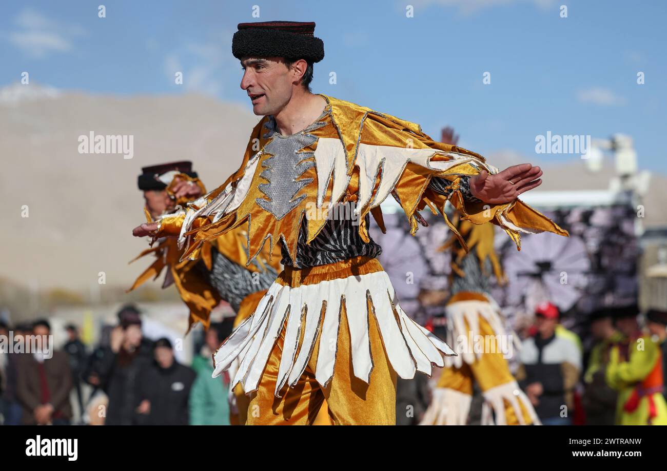 (240319) -- TAXKORGAN, March 19, 2024 (Xinhua) -- A resident performs a
