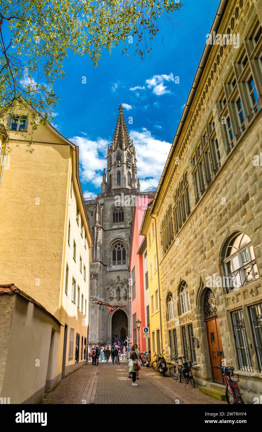 Great street view from the street Katzgasse leading to the west side of the famous Constance Cathedral where the entrance portal and the central tower... Stock Photo