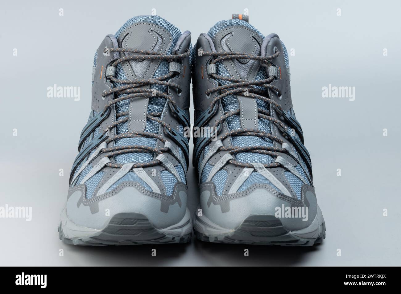 Front view of waterproof shoes with laces isolated on studio background Stock Photo