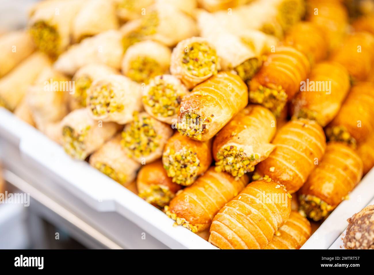 Delicious pastries filled with pistachios and nuts Stock Photo