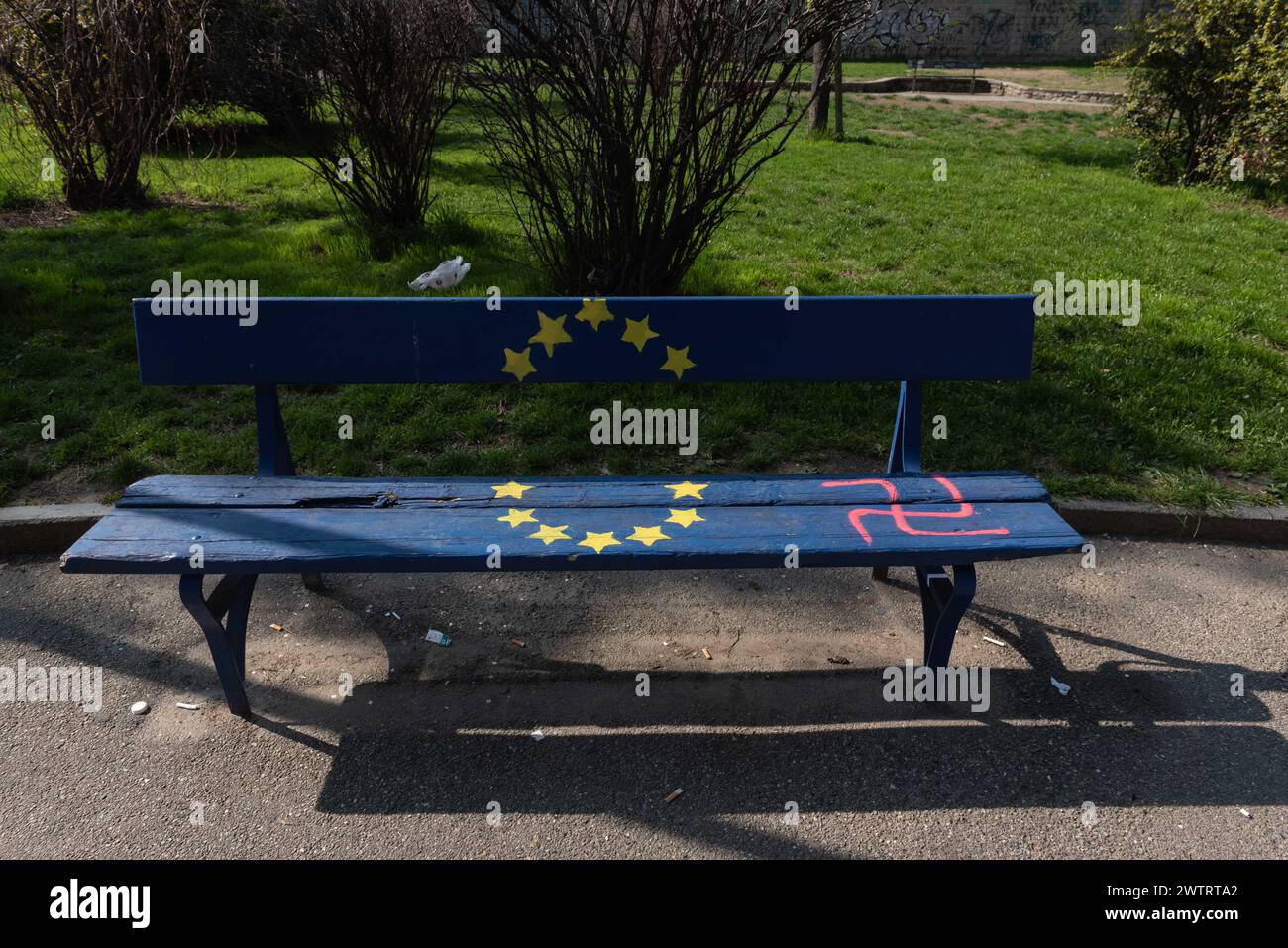 Svastica dipinta su una panchina su cui è raffigurata la bandiera dell'unione europea presso i giardini De Sanctis di corso Svizzera - Cronaca - Martedì 19 Marzo 2024 - ( Photo Matteo Secci/LaPresse )Swastika painted on a bench on which the flag of the European Union is depicted at corso Svizzera in Turin - News - Tuesday 19th March 2024 - (Photo Matteo Secci/LaPresse) Credit: LaPresse/Alamy Live News Stock Photo