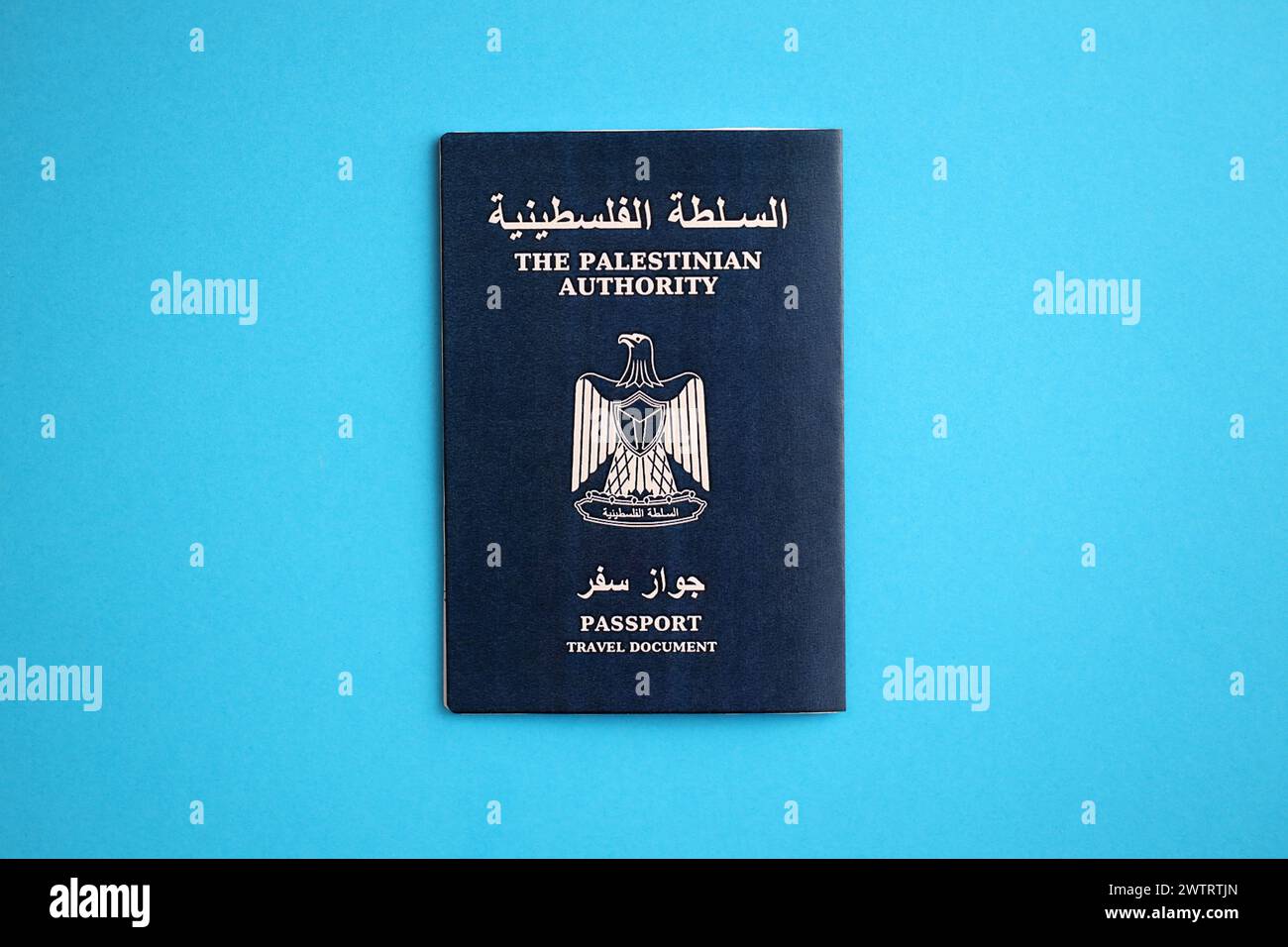 Blue Palestinian Authority passport on blue background close up