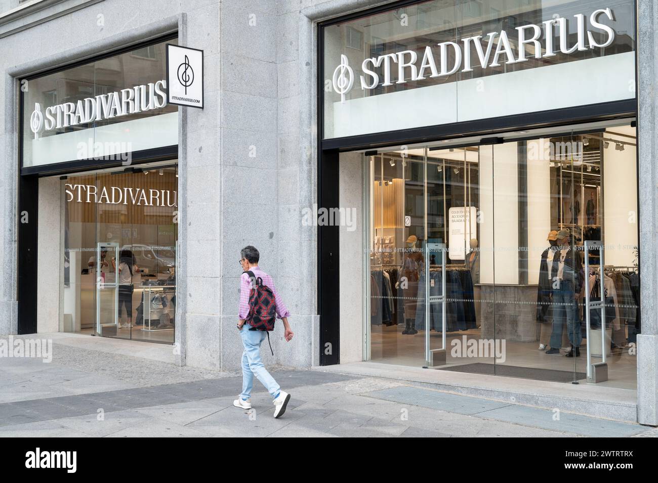 Madrid, Spain. 19th Mar, 2024. A pedestrian walks past the Spanish