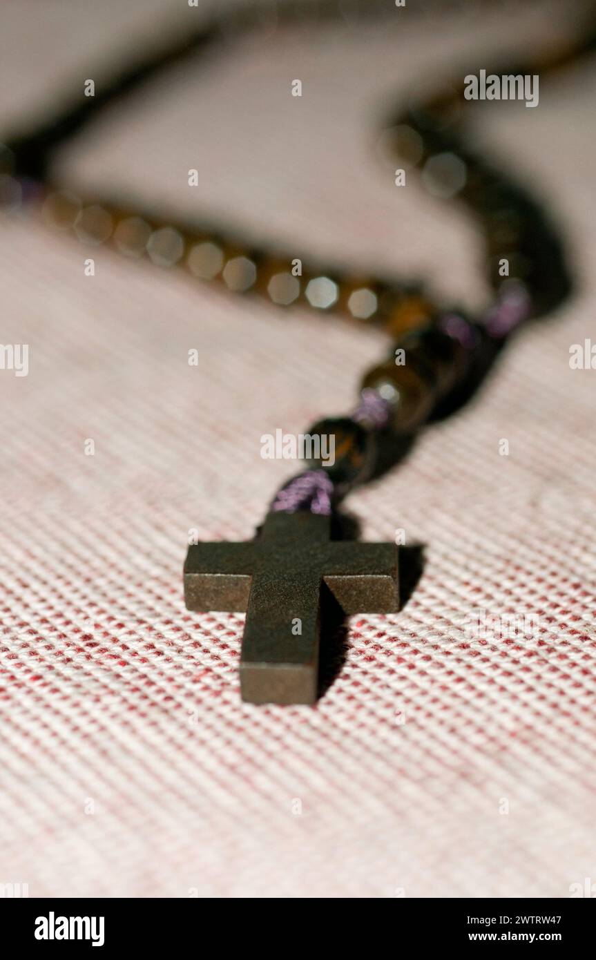 Rosary beads wooden cross hi-res stock photography and images - Alamy