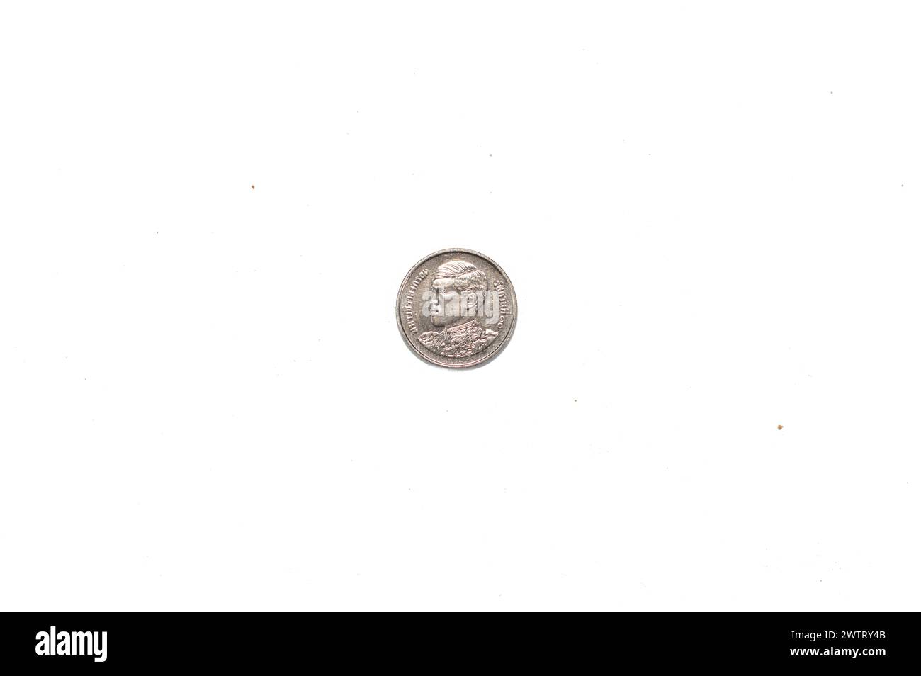 Obverse side of 1 one Baht Thai coin features Bust facing left of Maha Vajiralongkorn Rama X, 1 Baht - Rama X 1st portrait, 1 THB years 2561-2566 (201 Stock Photo