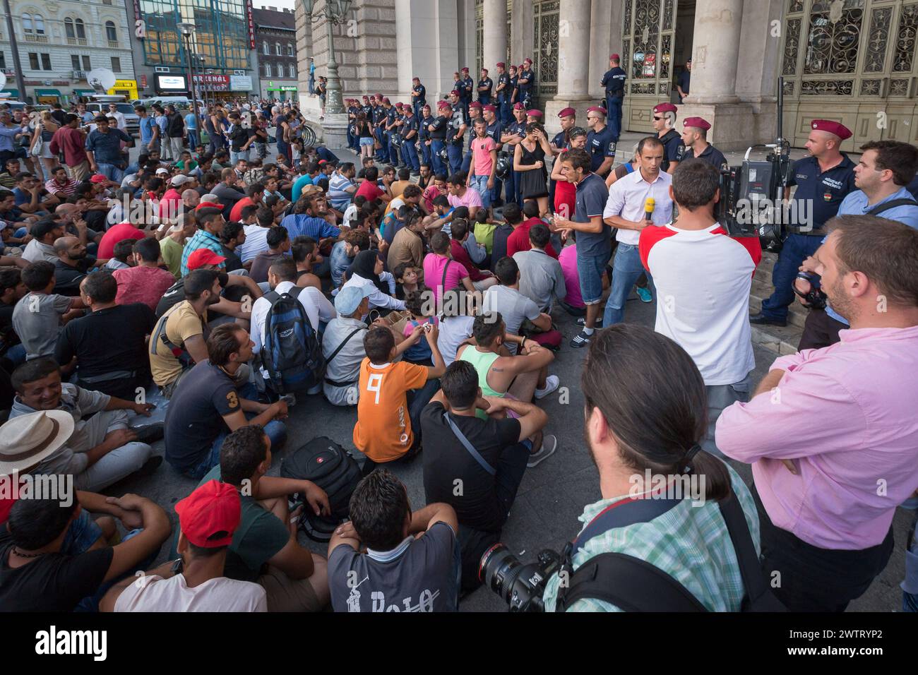 Syrian and other Arab Refugees crowd wait for their onward journey to Western Europe at Hungary, Budapest's Keleti railway station, on 09/02/2015. Stock Photo