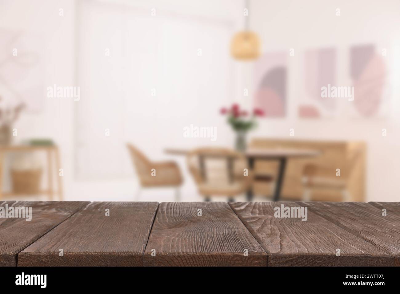 Empty wooden table in dining room. Space for design Stock Photo - Alamy