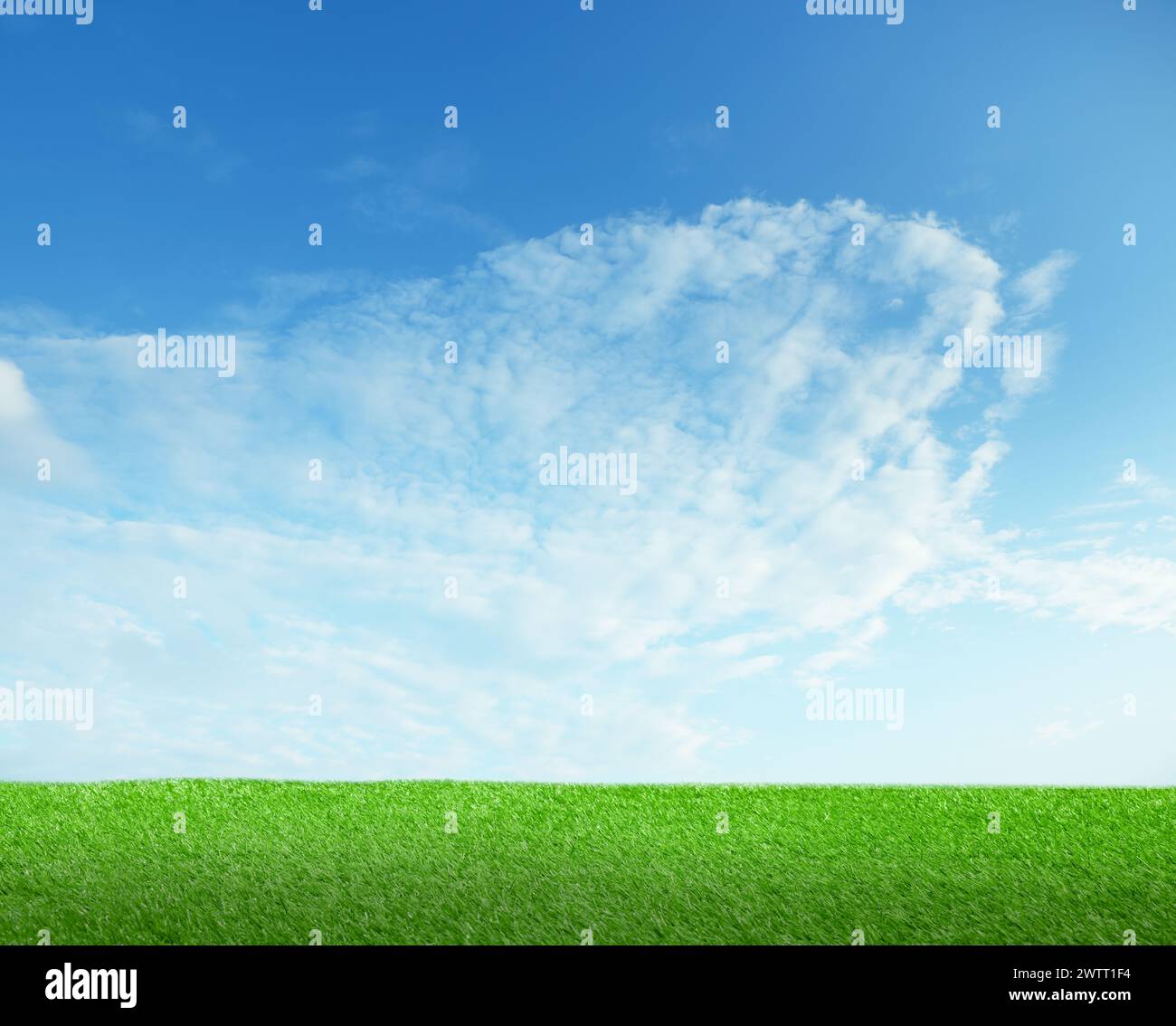 Green grass under blue sky with clouds Stock Photo - Alamy