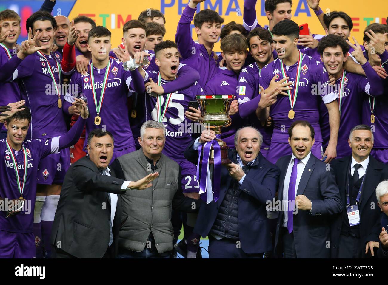 PHOTO REPERTORY - Parma, Italy, 28th April 2021. Joe Barone AC F Fiorentina Managing Director, Daniele Prade ACF Fiorentina Director of Sport, Rocco B Comisso Chairman of ACF Fiorentina and Joseph B Comisso celebrate with the players and the trophy following the 2-1 victory in the Primavera Italian Cup match at Stadio Ennio Tardini, Parma. Picture credit should read: Jonathan Moscrop/Sportimage via PA Images (Parma - 2021-04-28, Jonathan Moscrop/ipa-agency.net) ps the photo can be used respecting the context in which it was taken, and without intent defamatory of the decorum of the people Stock Photo