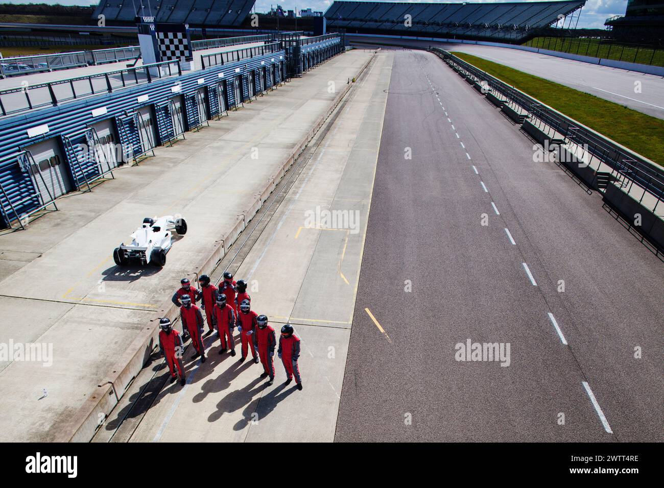 Pit crew readying for a race day at the track stock photo alamy
