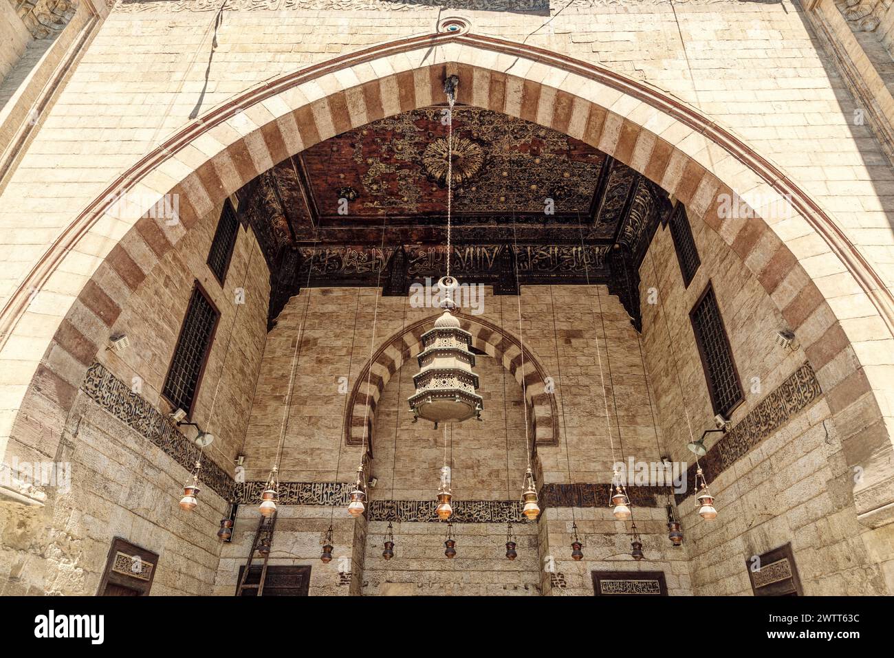 Arch and decorated ceiling Al Ashraf Bersbay Mosque, Qlqwun Complex, Islamic Cairo, Cairo, Egypt Stock Photo