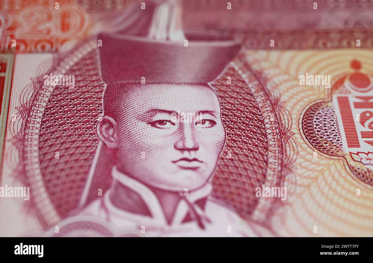 Closeup portrait of communist revolutionary, Father of mongolian revolution Damdin Sukhbaatar  on old Tugrik currency banknote Stock Photo