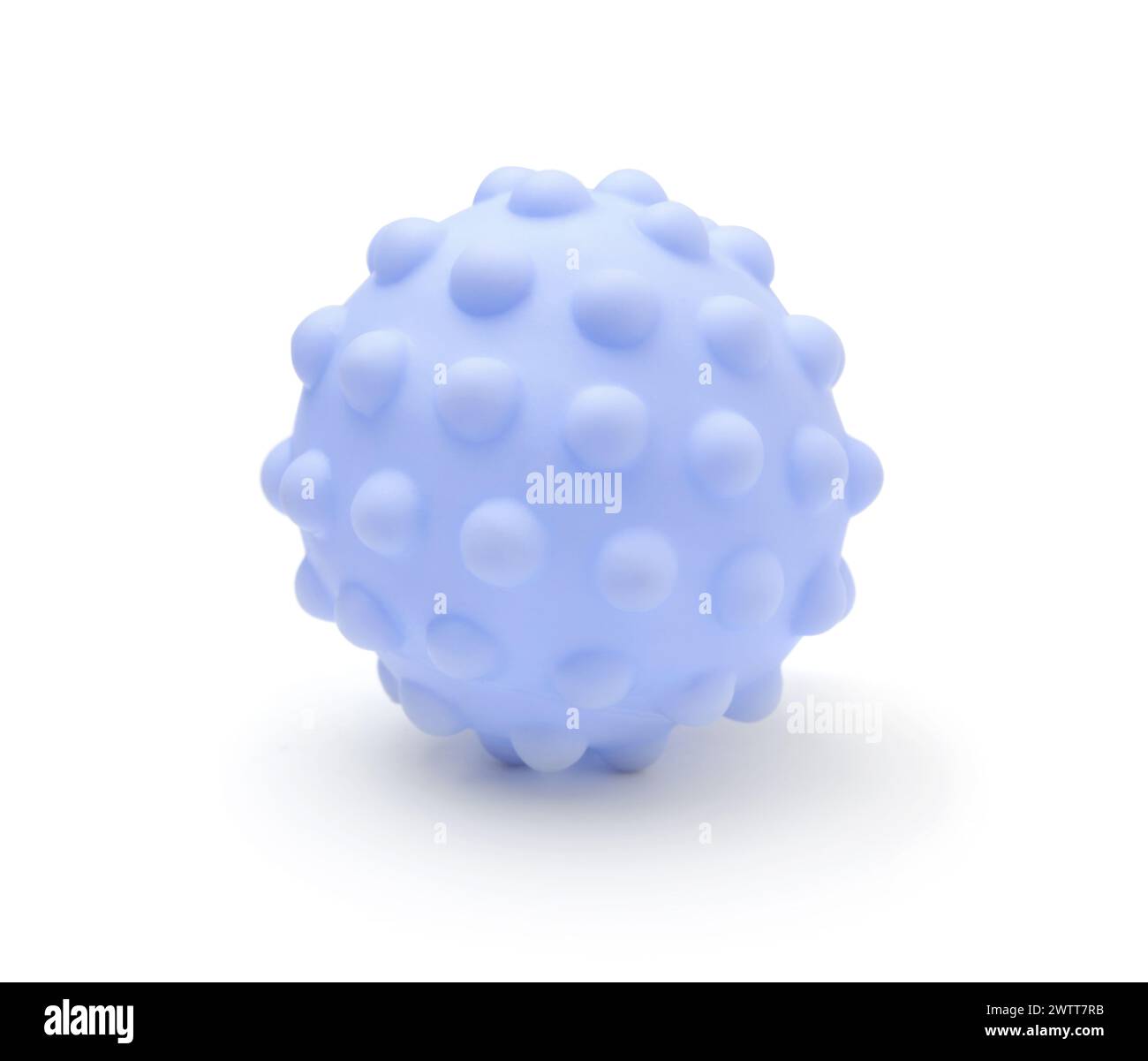Small new blue rubber ball isolated on white. Stock Photo