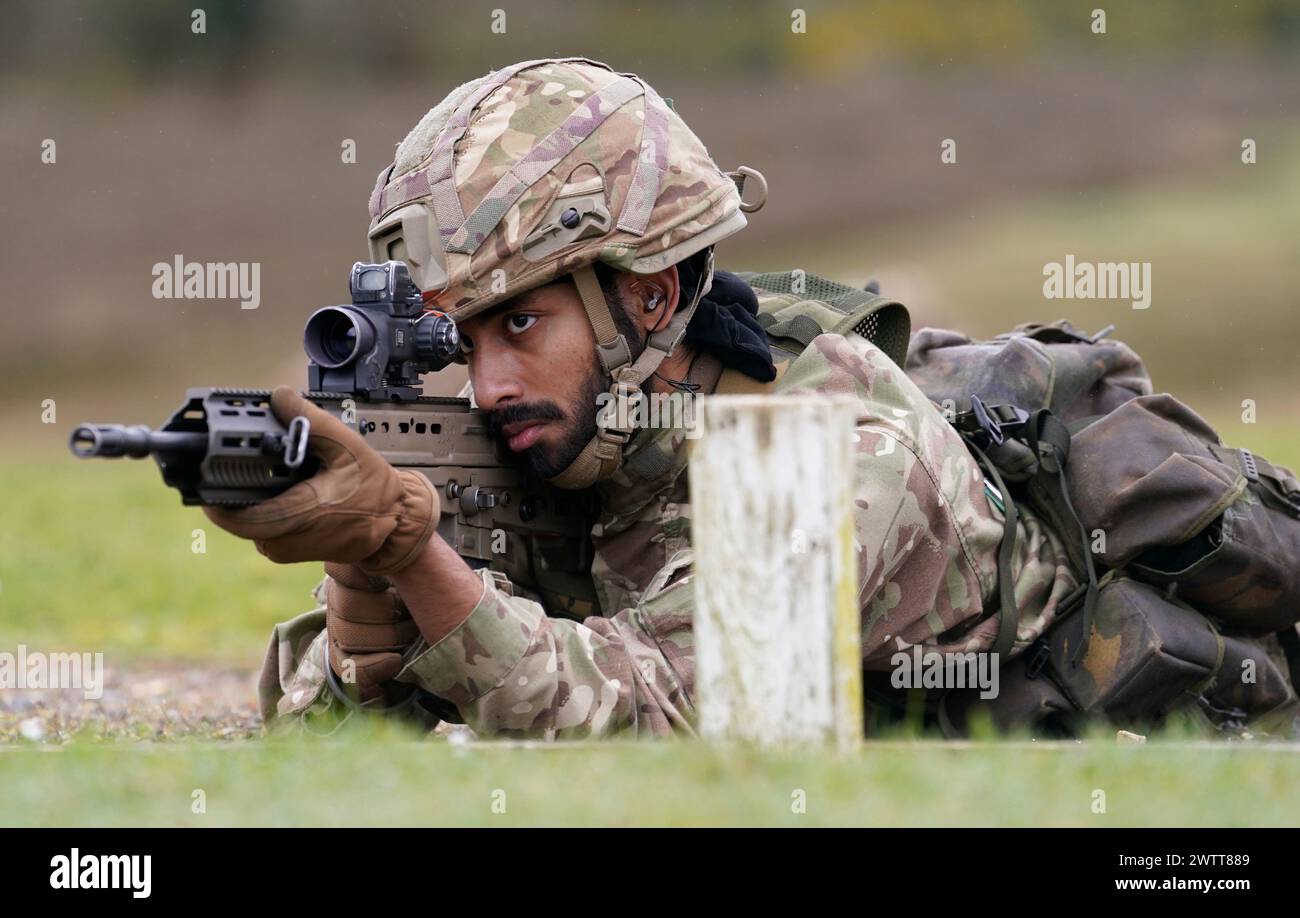 A Sikh soldier of the British Army competes in a shooting competition during the Holla Mahalla Sikh military festival, at the Aldershot Garrison, Hampshire. The centuries old Hola Mahalla festival celebrates Sikh martial traditions, and promotes courage, preparation, and readiness. Picture date: Tuesday March 19, 2024. Stock Photo