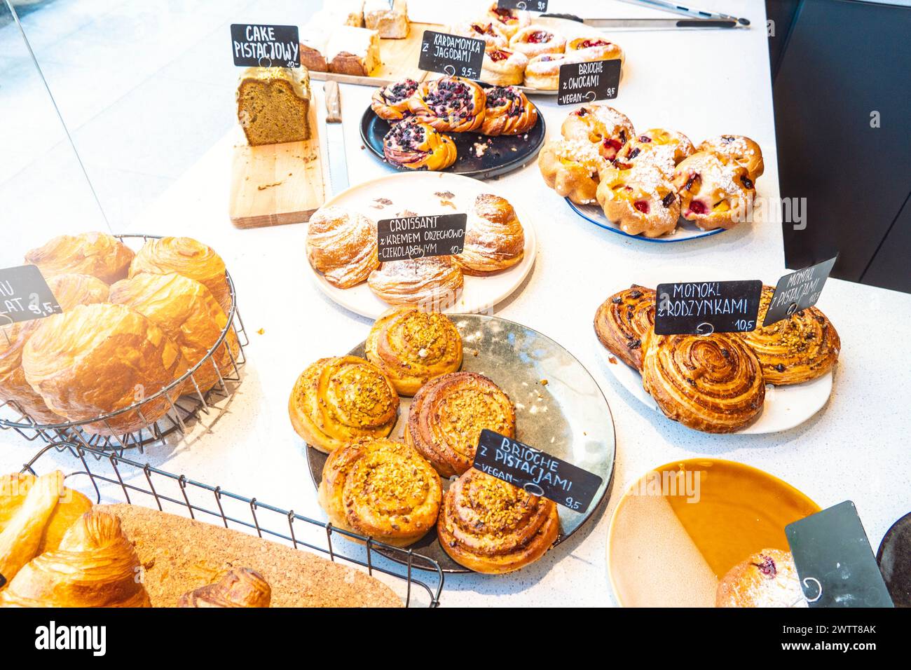 A delicious display of assorted pastries at a bakery shop. Stock Photo