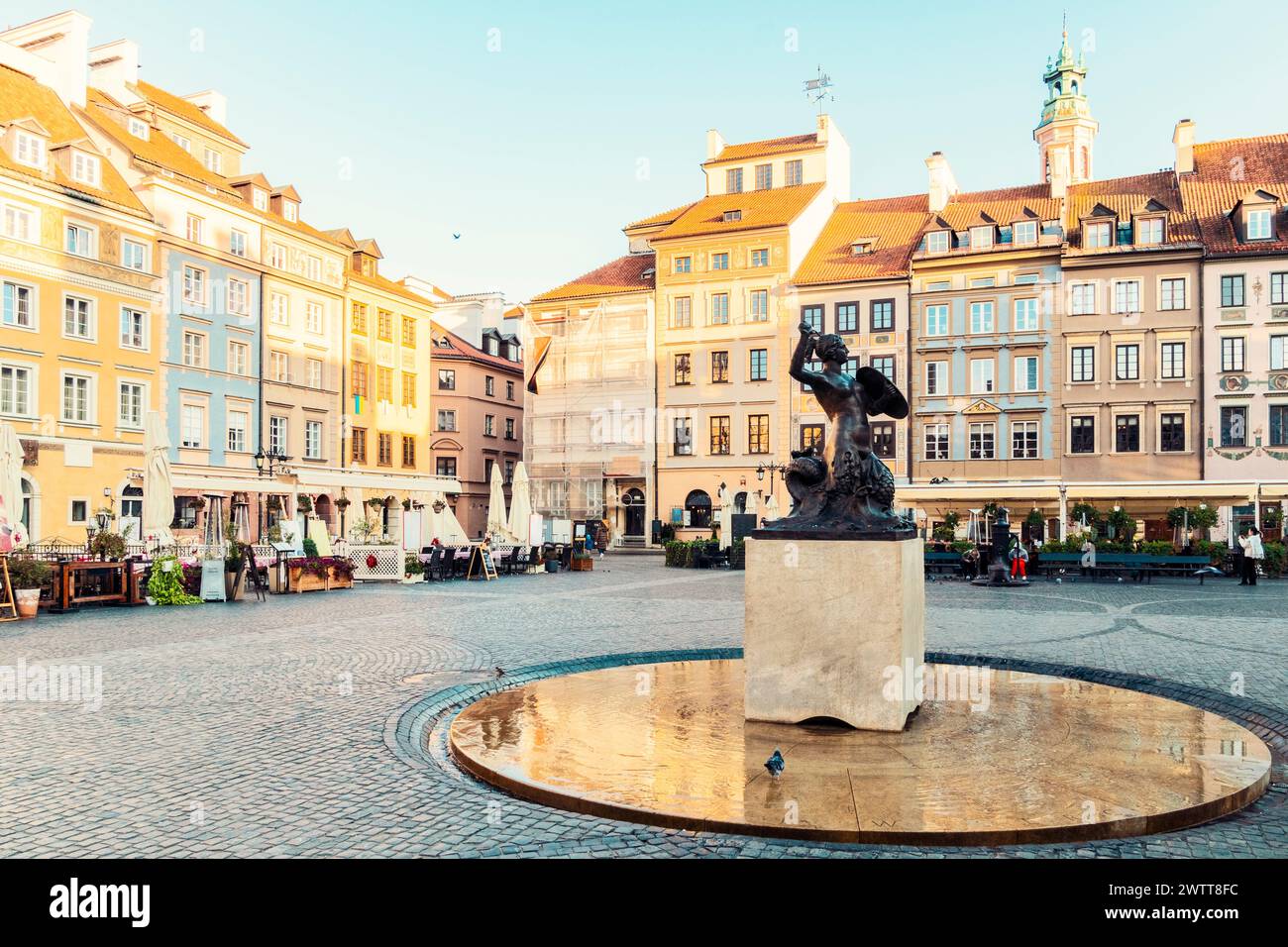 Famous Mermaid statue with historic colorful houses at Old Town Market Square, Warsaw, Poland Stock Photo
