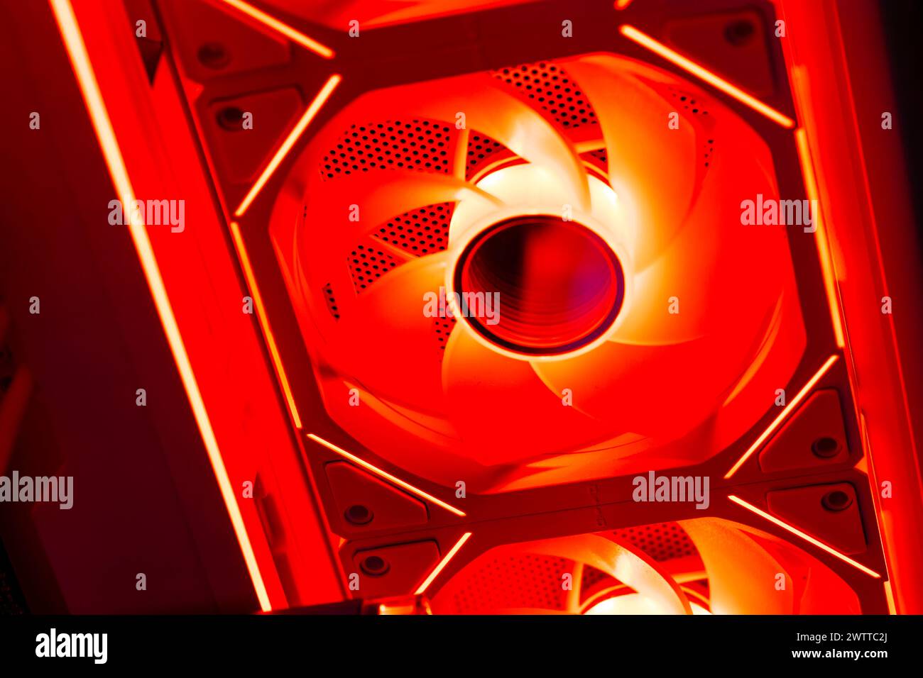 Internal components of an illuminated high-end gaming PC, symbolizing ...