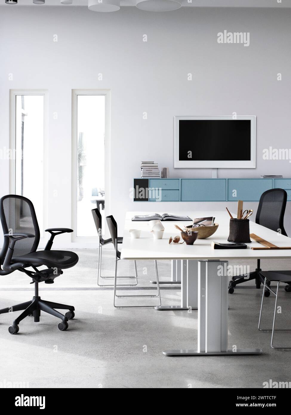 Minimalist office space with a clean, modern design Stock Photo