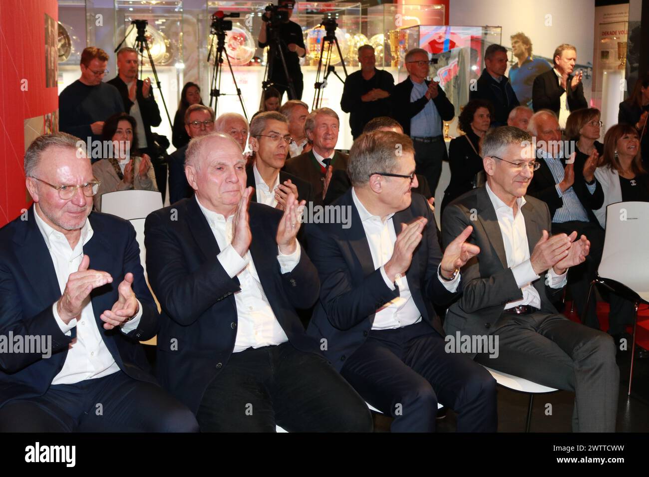 MUNICH, Germany - 19. MARCH 2024: Sepp MAIER, former professional footballer, goalkeeper, celebrated with friends and family and the FcBayern Management his 80th birthday (28th of February) whilst the opening of a special and attractive Exhibition on March 19th at Allianz Arena. Karl-Heinz Rummenigge, FC Bayern München Honorary President Uli Hoeness, Jan-Christian Dreesen, CEO of FC Bayern München, Herbert Hainer, President of FC bayern München, Fc Bayern Muenchen created a Sepp MAIER exhibition in the Museum Pavillion at the Allianz Arena in Munich and attended the grand opening. Football Stock Photo