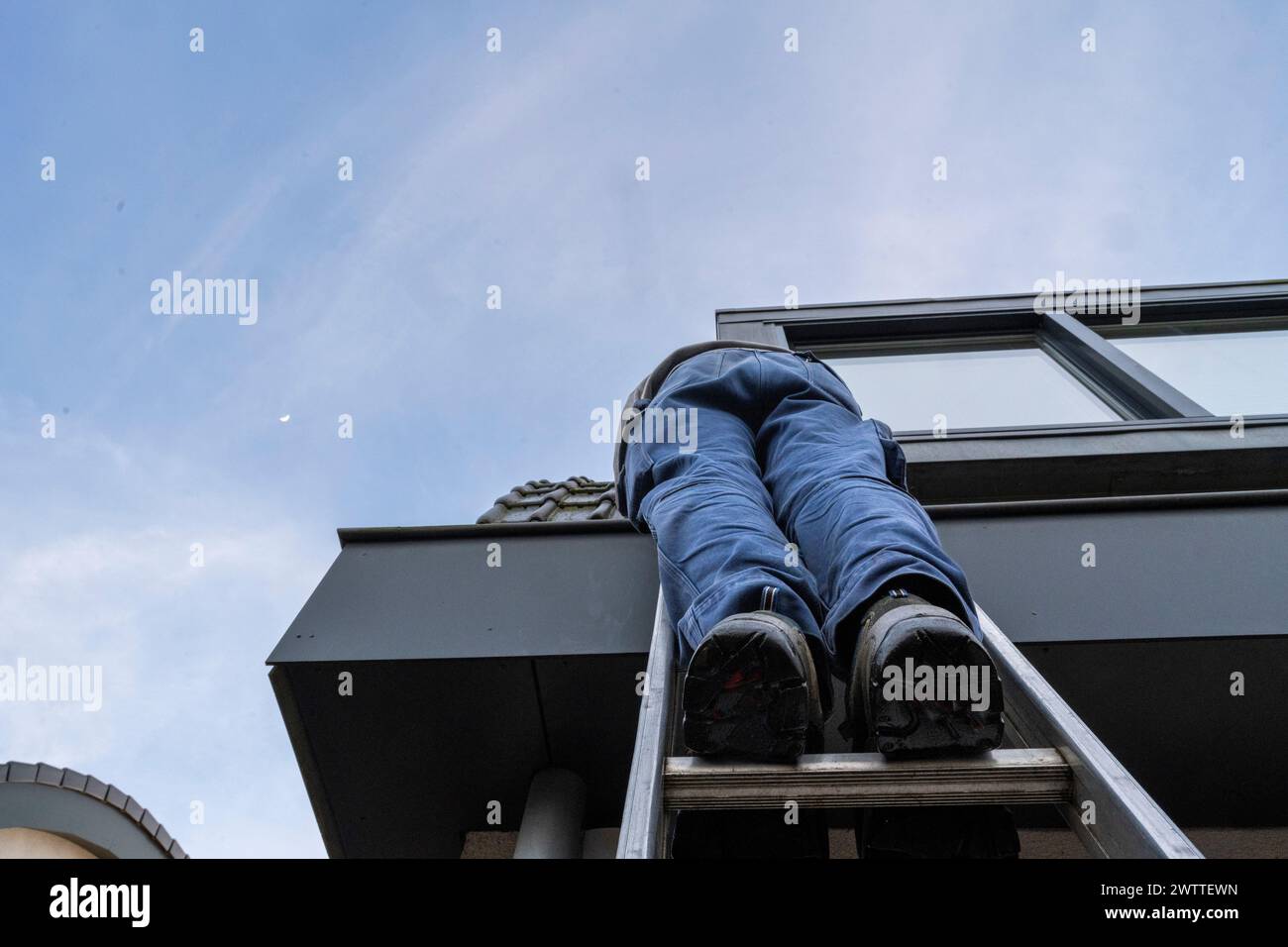 Climbing the corporate ladder, taken from an unconventional angle. Stock Photo