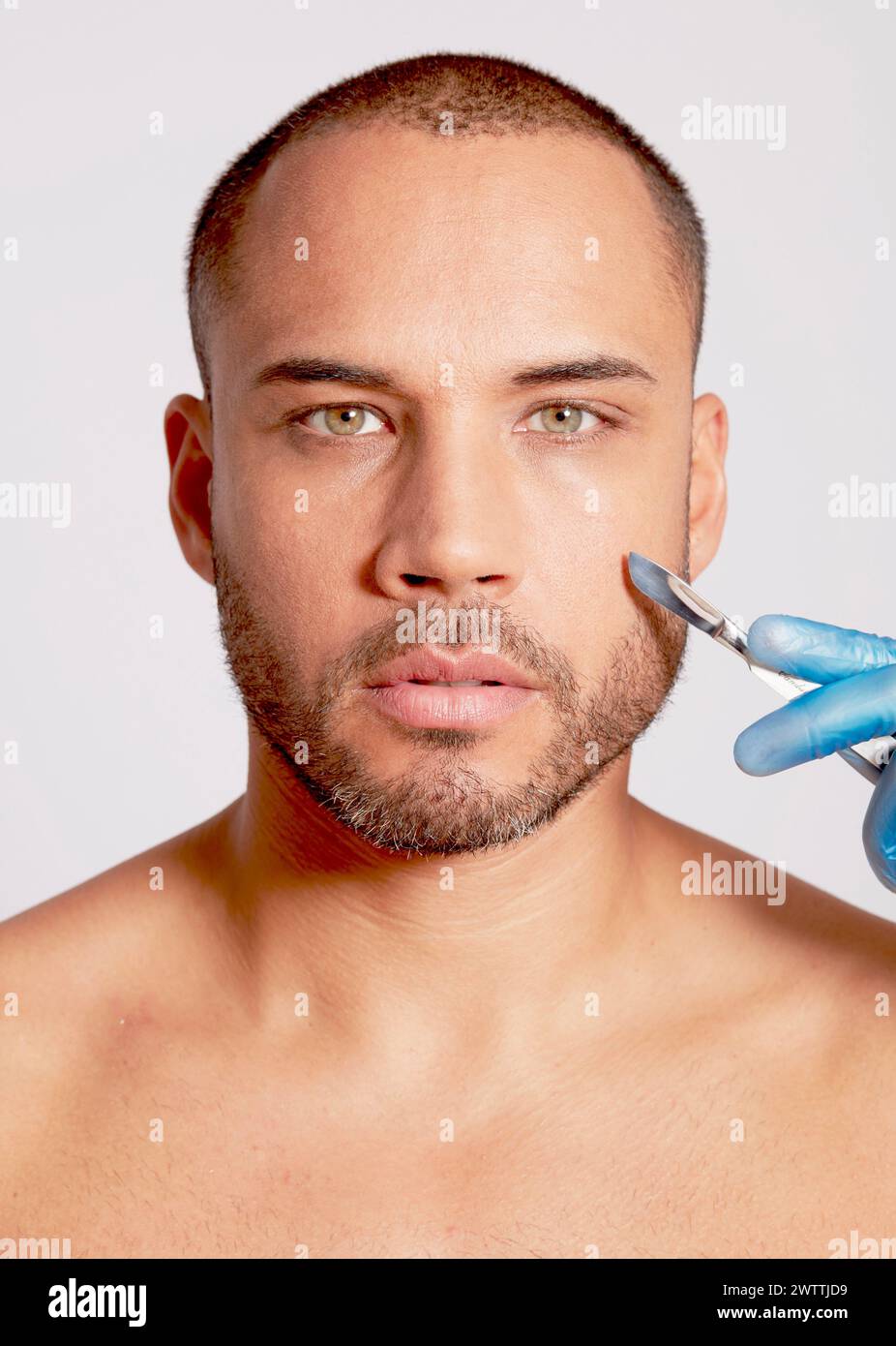 Man receiving cosmetic injection Stock Photo