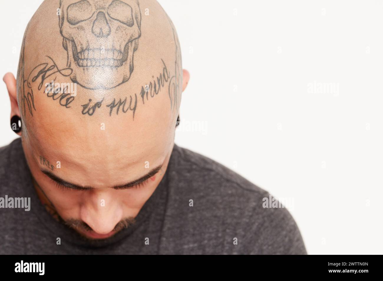 Guy with Skull Face Tattoo Makes a Bold Statement