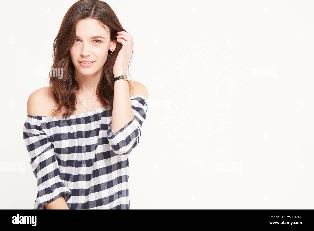 Woman in a white top hi-res stock photography and images - Alamy