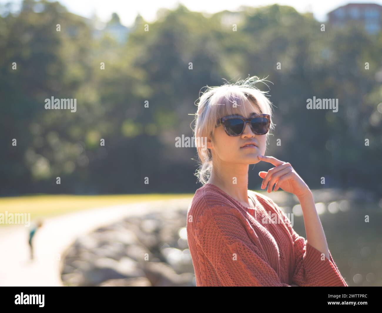 Woman posing outdoors hi-res stock photography and images - Alamy