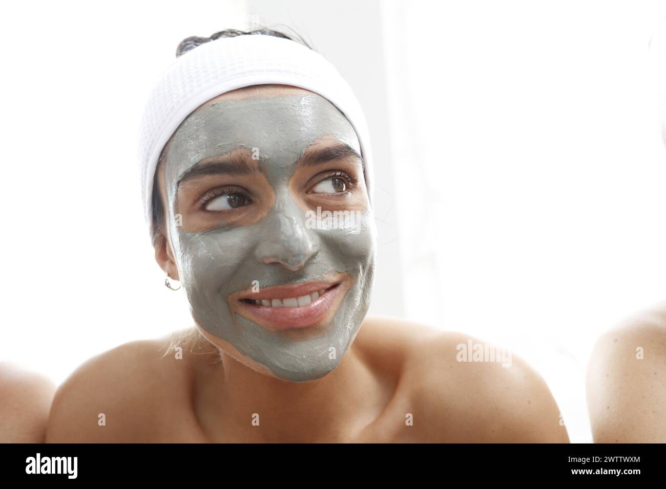Person with a facial mask looking away Stock Photo