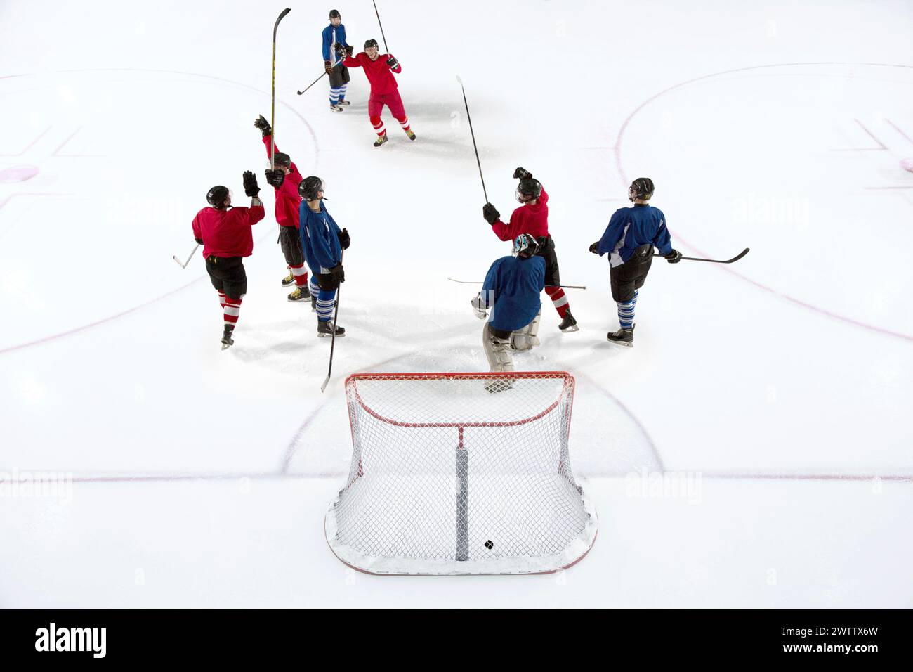 Ice hockey players celebrating a goal Stock Photo