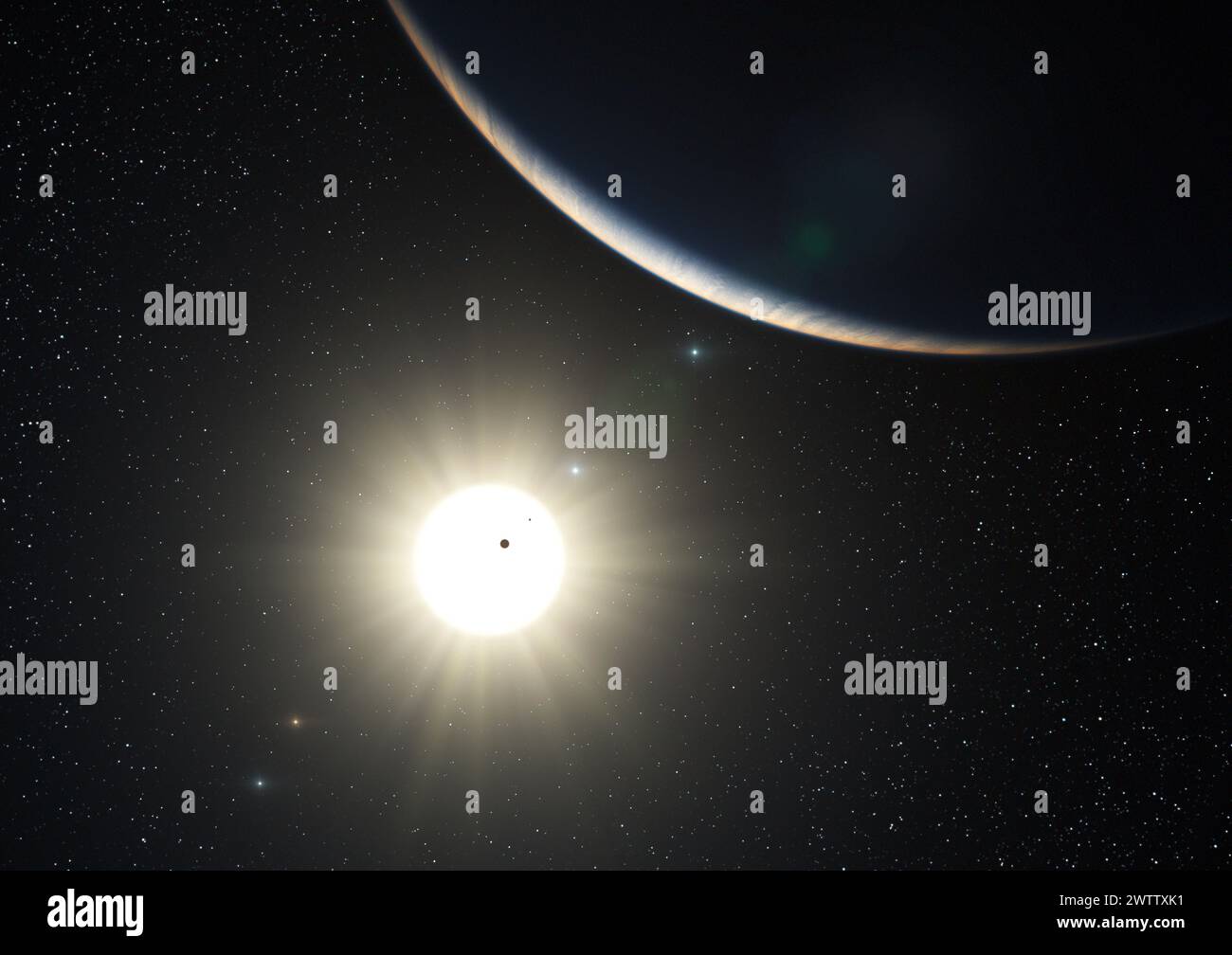 Planetary transit across a star in space Stock Photo