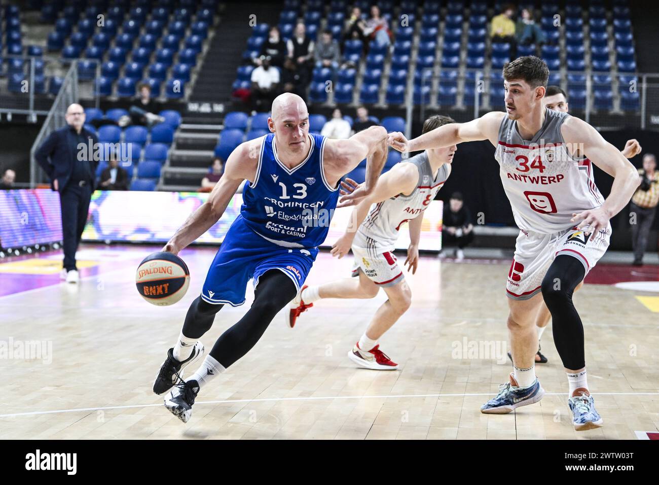 Antwerp, Belgium. 19th Mar, 2024. Groningen's David Gabrovbsek and